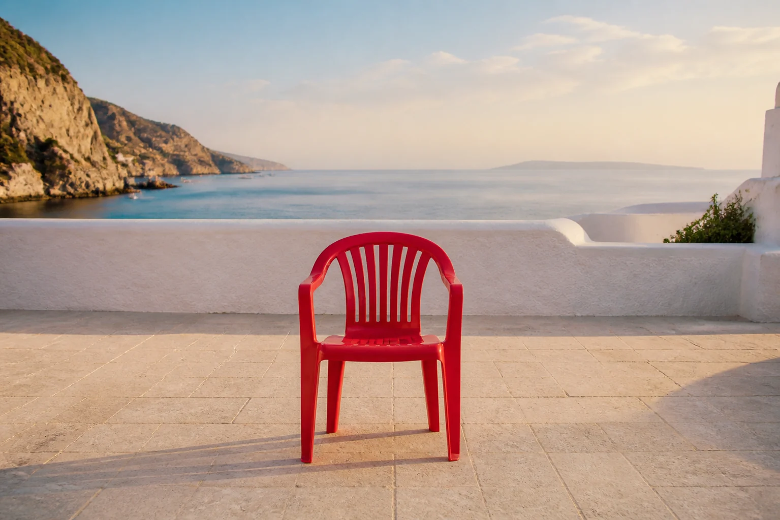 The same Mediterranean terrace with an unwanted red chair
